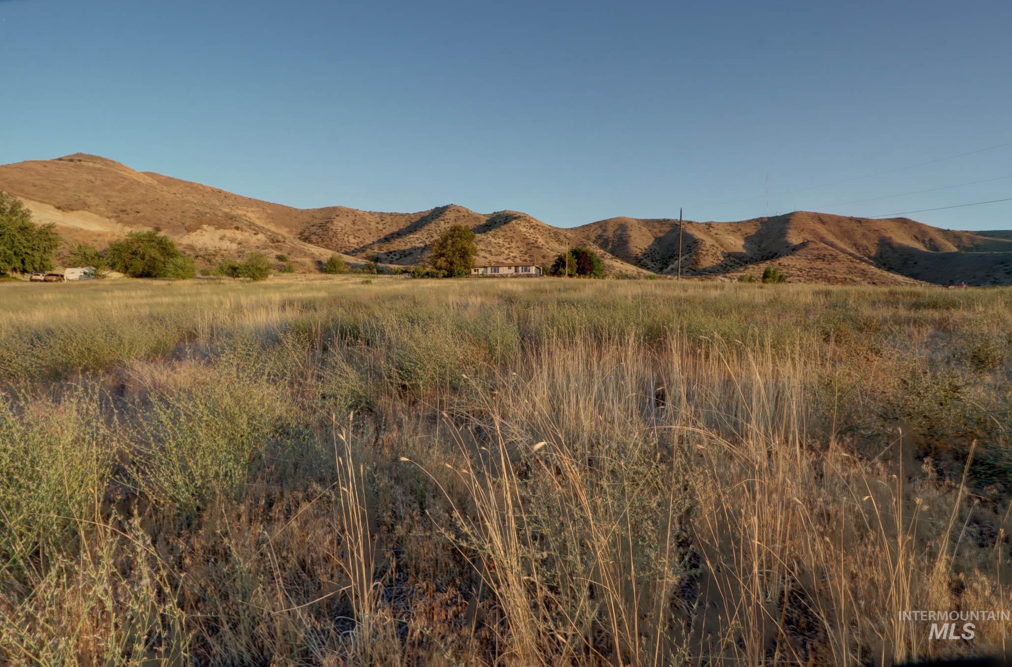 779 West South Slope Road Emmett, ID 83617 - Photo 7 of 12 View of mountain backdrop with rural landscape
