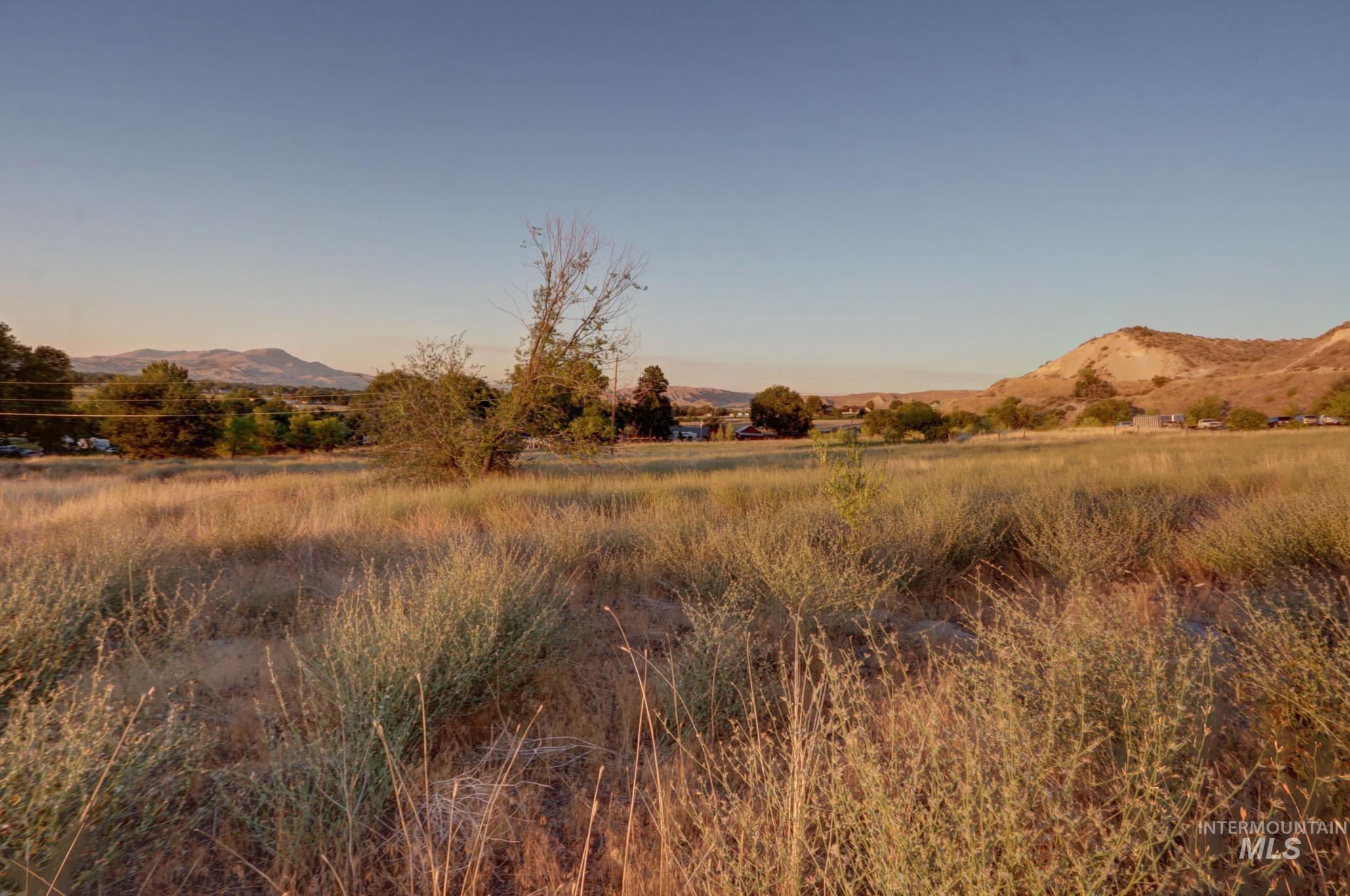 779 West South Slope Road Emmett, ID 83617 - Photo 8 of 12 View of mountain background featuring rural landscape