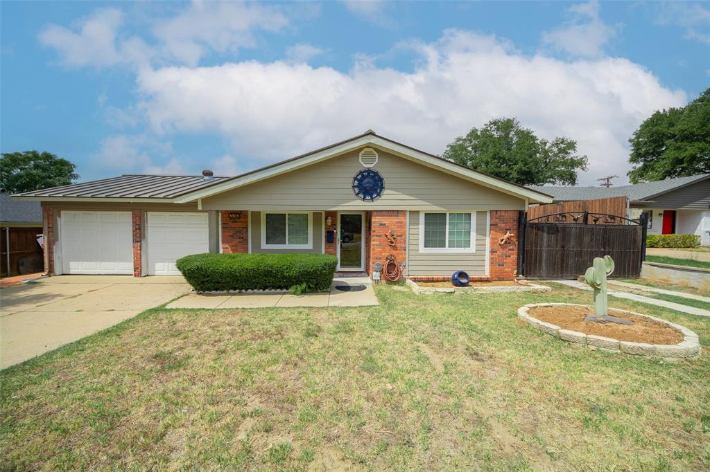 310 Franklin Drive Euless, TX 76040 - Photo 1 of 1 a front view of house with yard and green space