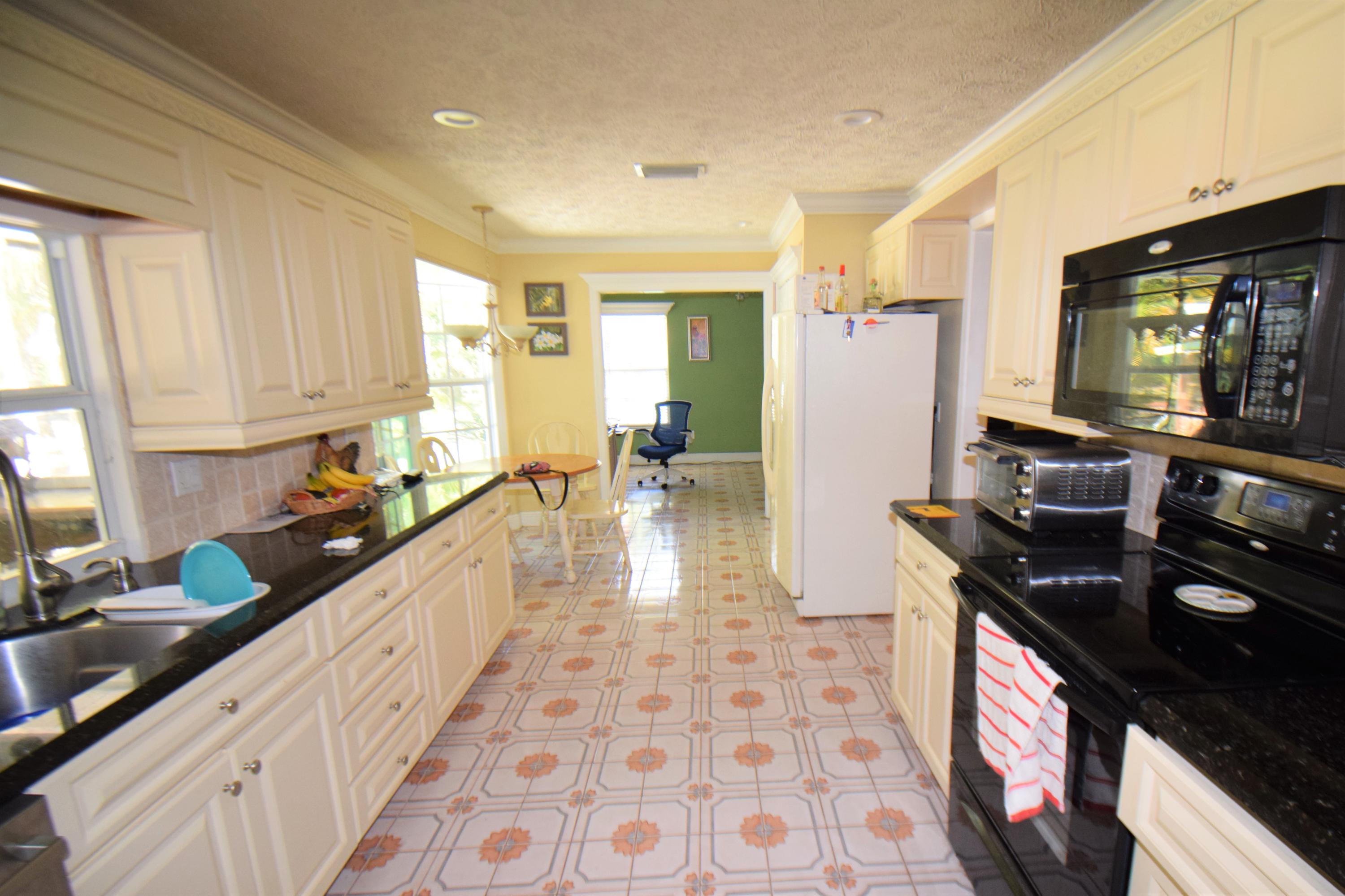 16281 Randolph Siding Road Jupiter, FL 33478 - Photo 43 of 51 kitchen 3