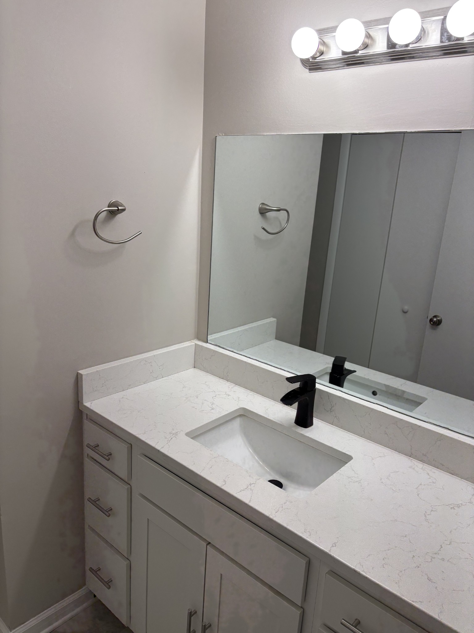 1358 Hurricane Ridge Road Smithville, TN 37166 - Photo 12 of 29 a bathroom with a sink and a mirror