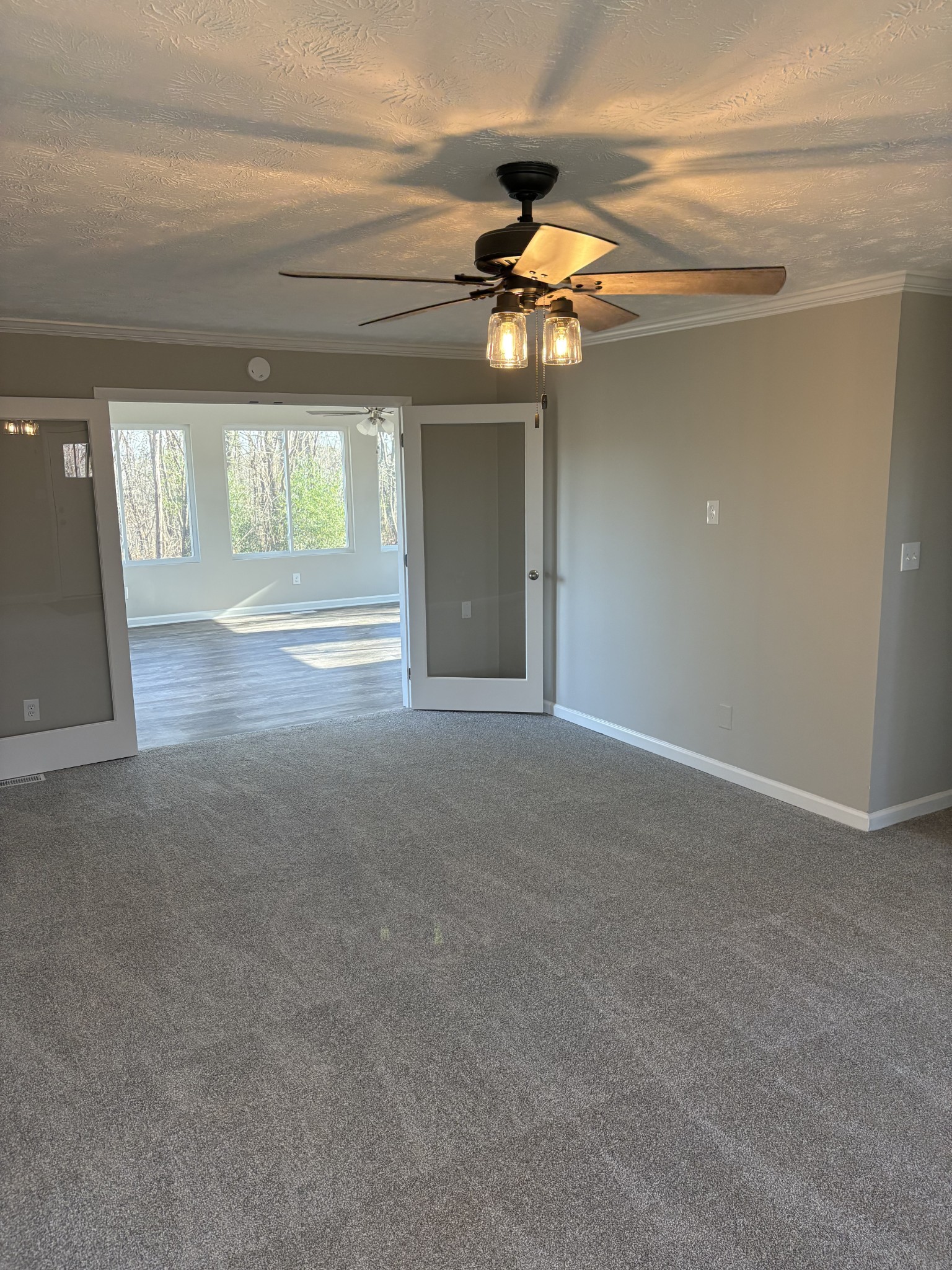 1358 Hurricane Ridge Road Smithville, TN 37166 - Photo 14 of 29 a view of a livingroom with a ceiling fan and window