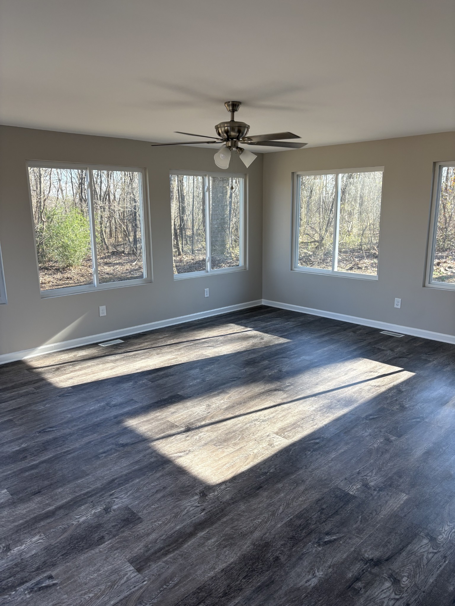 1358 Hurricane Ridge Road Smithville, TN 37166 - Photo 16 of 29 an empty room with wooden floor and windows