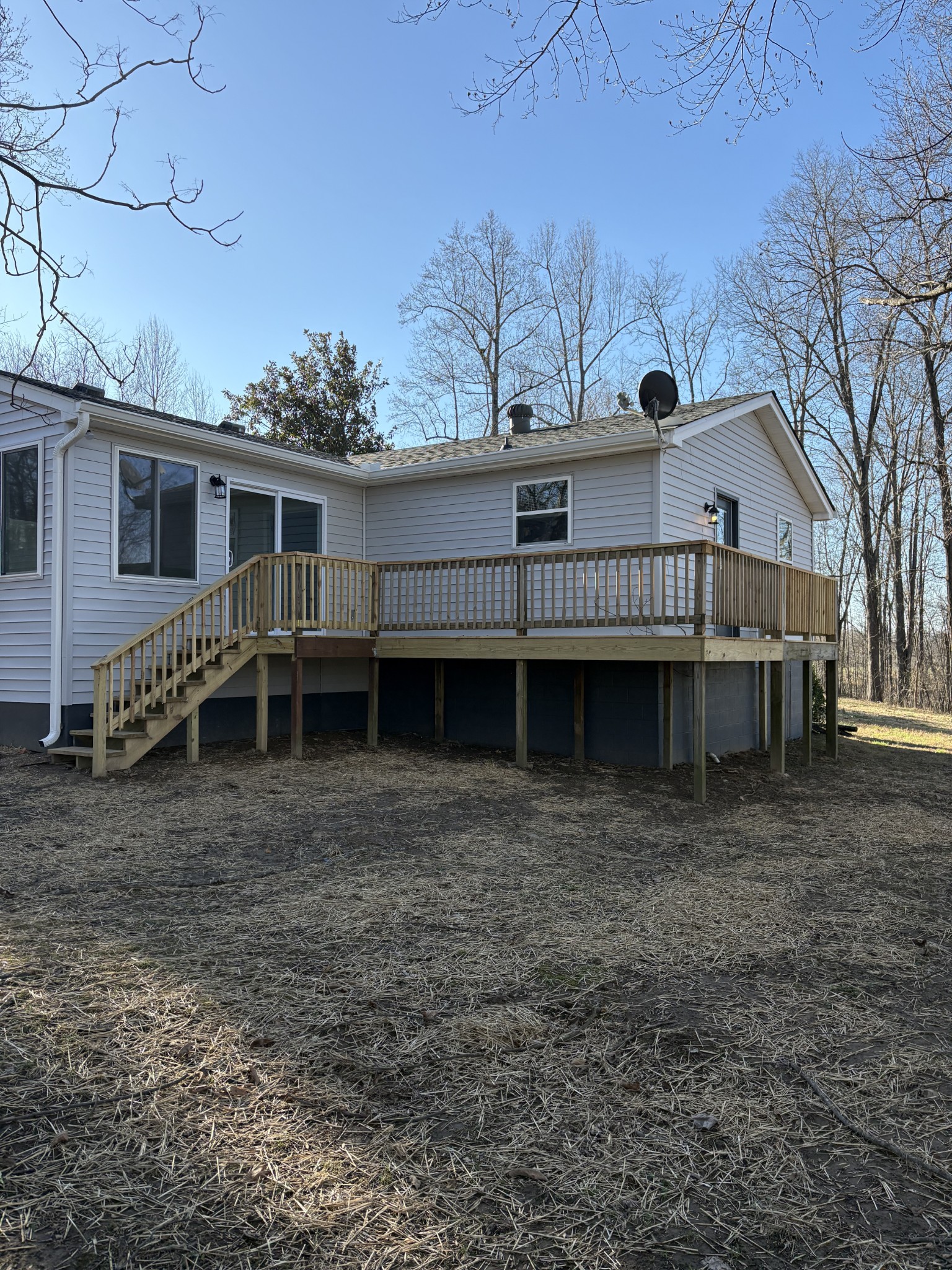 1358 Hurricane Ridge Road Smithville, TN 37166 - Photo 4 of 29 a view of a house with a yard and large trees