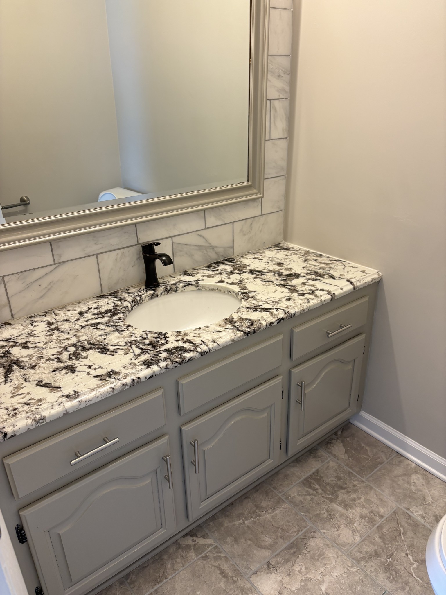 1358 Hurricane Ridge Road Smithville, TN 37166 - Photo 6 of 29 a bathroom with a granite countertop sink and a mirror