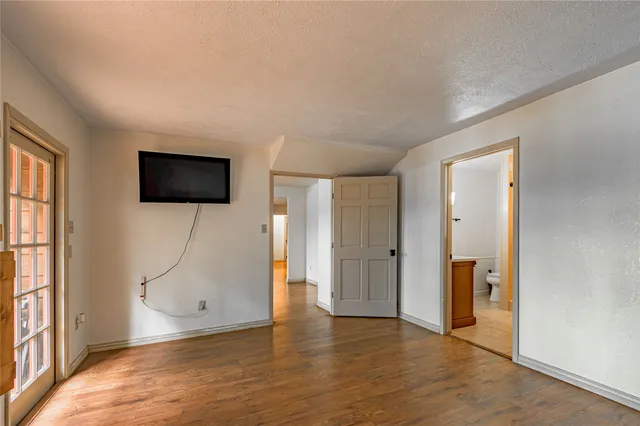 a bathroom with a sink a mirror and shower