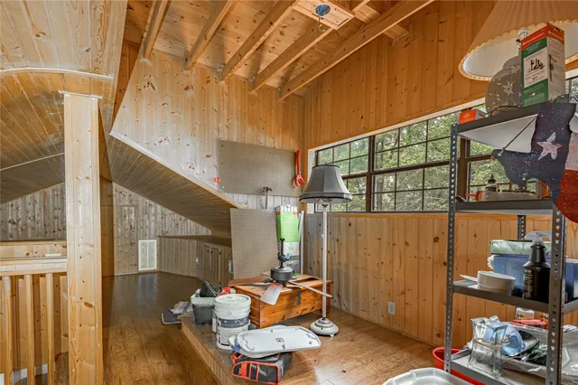 a view of a house with porch and wooden floor