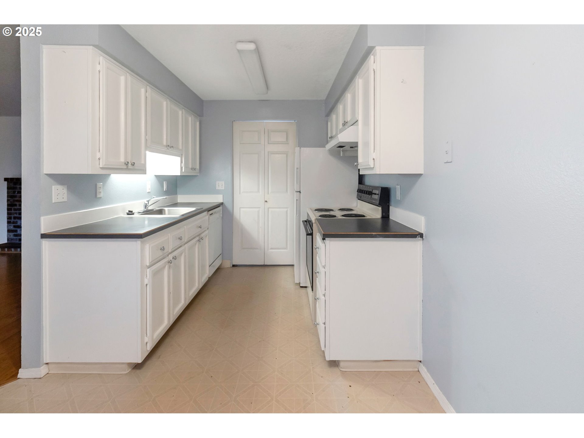 8524 Southwest Mohawk Street Tualatin, OR 97062 - Photo 9 of 30 a kitchen with a sink stove and cabinets