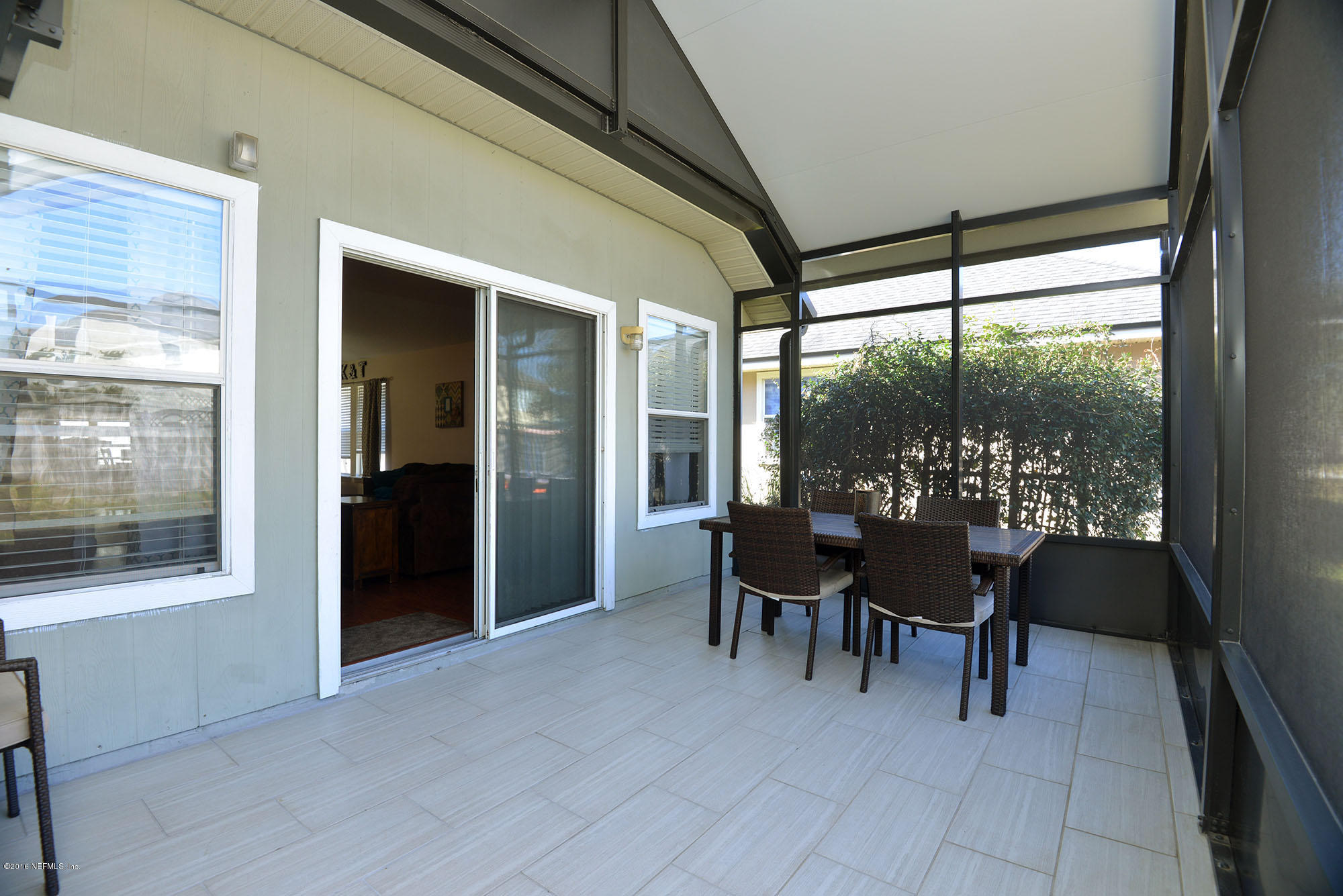 1226 Splendid Ravine Street St. Augustine, FL 32092 - Photo 26 of 38 27 - Covered and Screened Back Patio