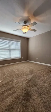 a view of a living room with hardwood floor
