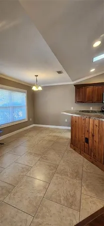 a view of a living room and dining room