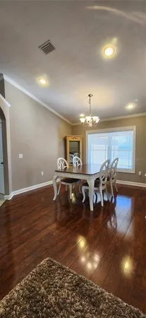 a view of living room with furniture and fireplace