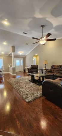 a kitchen with stainless steel appliances a stove a sink and a microwave