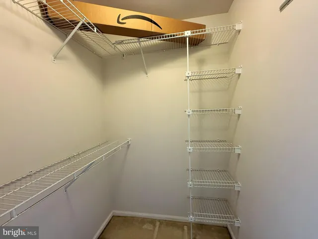 a view of a room with racks on the wall