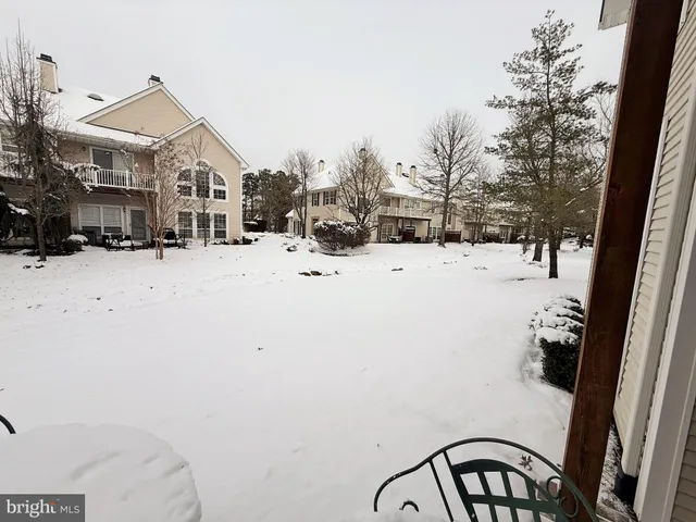 a view of a house with a snow