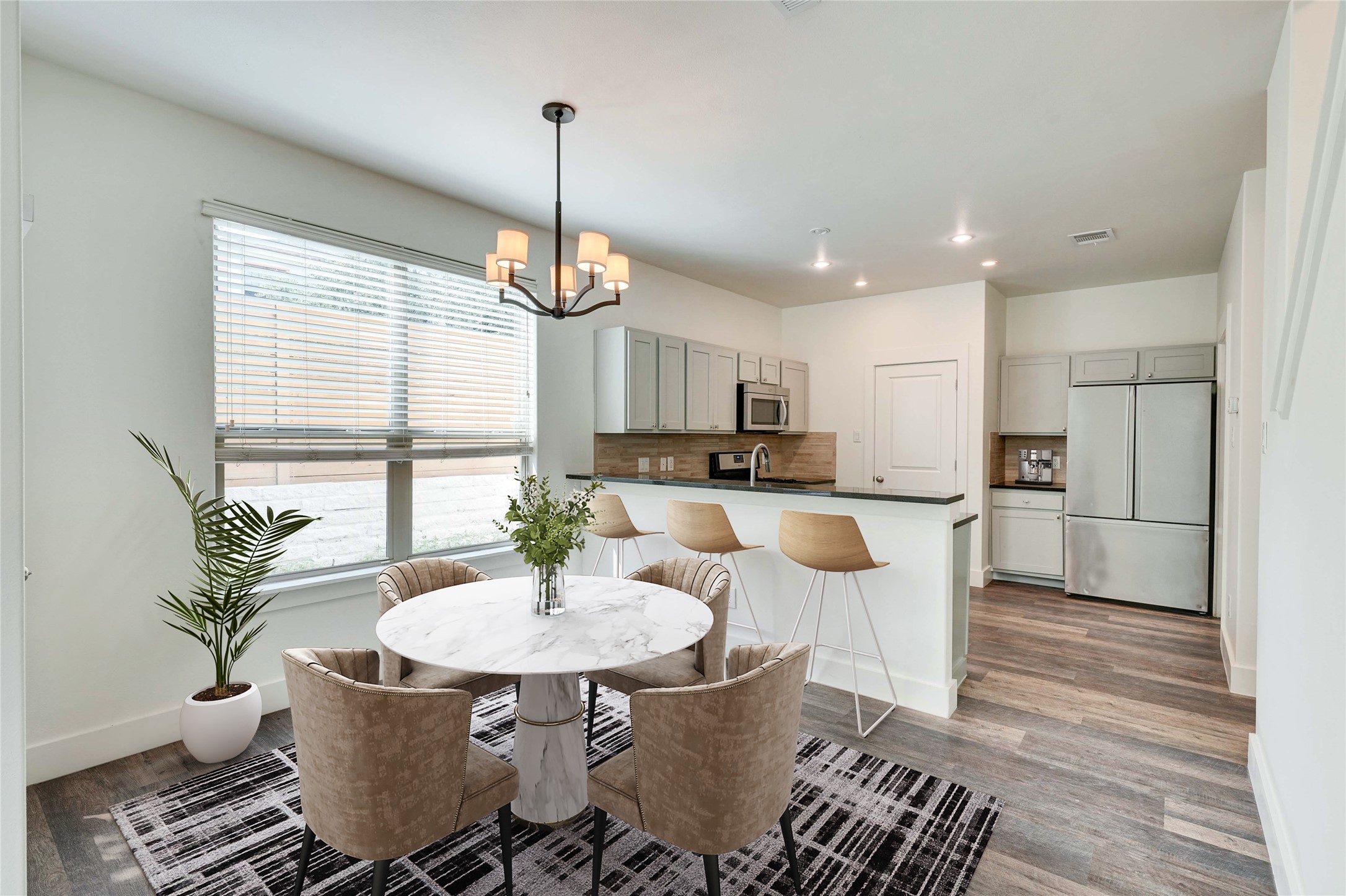 4124 Valley View Road, Unit 4A & 4B Austin, TX 78704 - Photo 24 of 40 An open concept design seamlessly connects the dining area to a well-appointed kitchen.