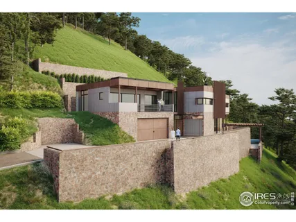 a aerial view of a house with a garden and plants