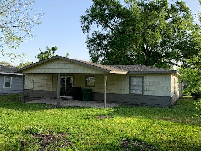 5244 Enyart Street Houston, TX 77021 - Photo 12 of 12 front view of a house with a yard