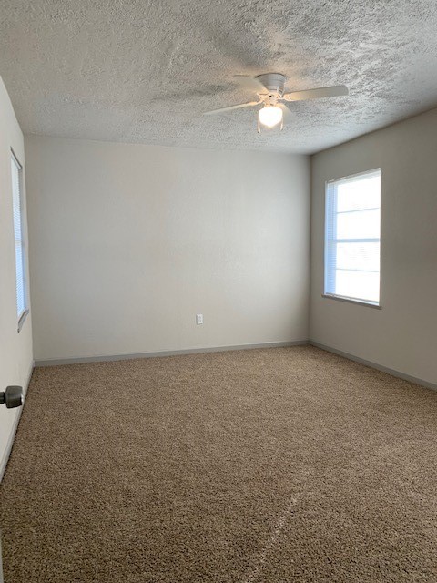 5244 Enyart Street Houston, TX 77021 - Photo 7 of 12 an empty room with a window