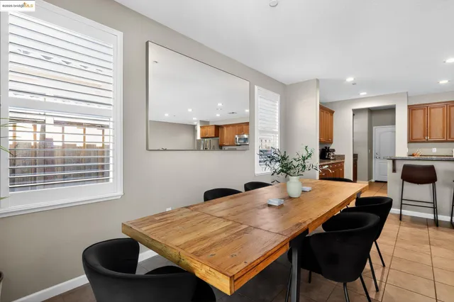 a white bath tub sitting next to a window