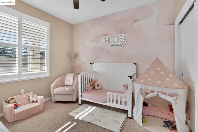 an aerial view of a house with a yard and potted plants