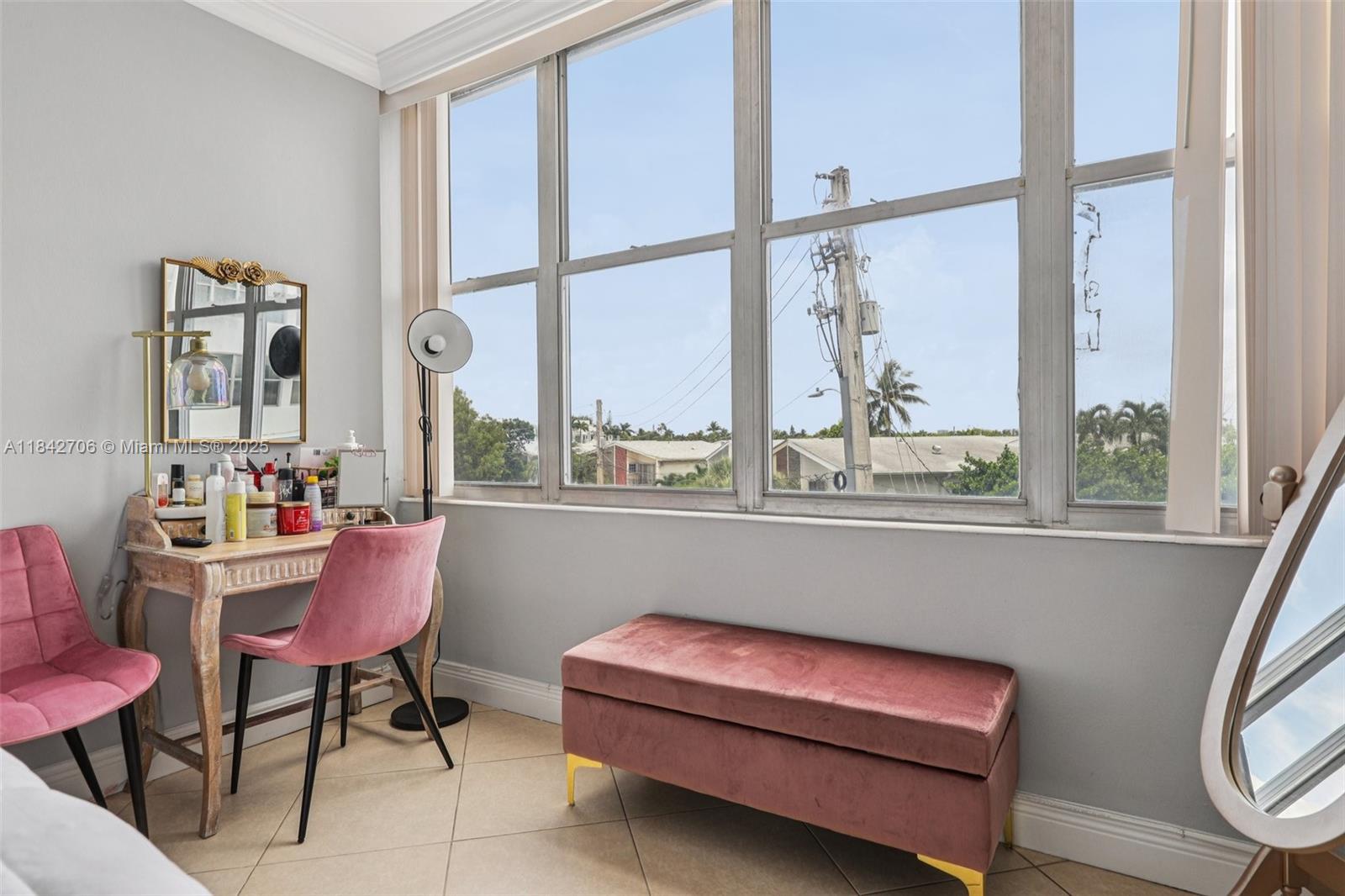 7441 Wayne Avenue, Unit 2B Miami Beach, FL 33141 - Photo 15 of 30 a reading room with furniture and a window