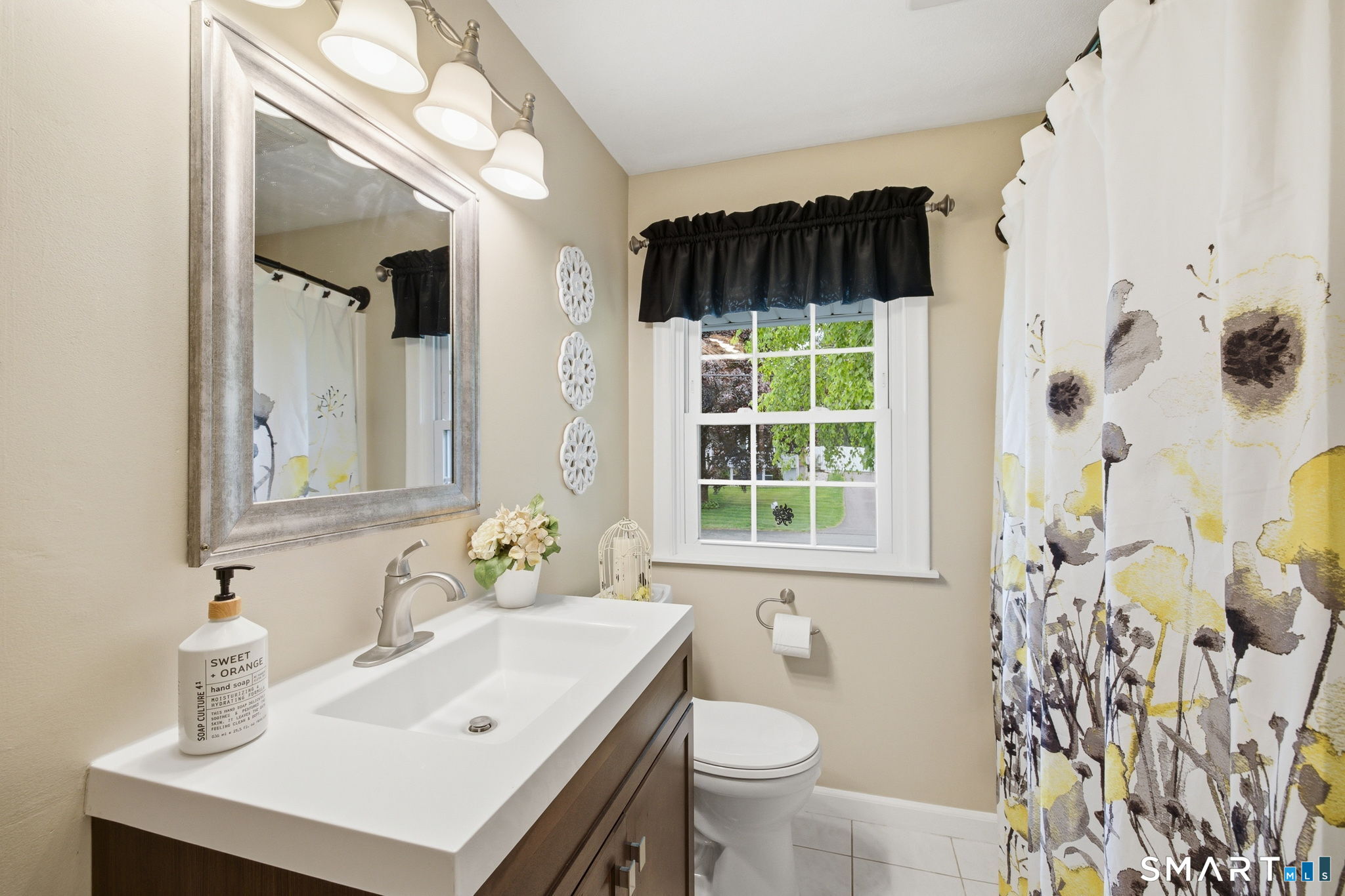 7 Stardust Drive Enfield, CT 06082 - Photo 17 of 38 a bathroom with a sink toilet and shower