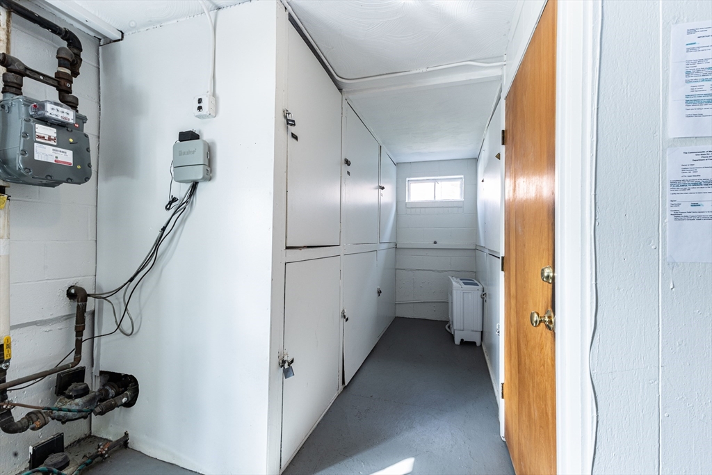 186 Lexington Street, Unit 8 Watertown, MA 02472 - Photo 15 of 22 a view of a hallway with wooden floor and staircase