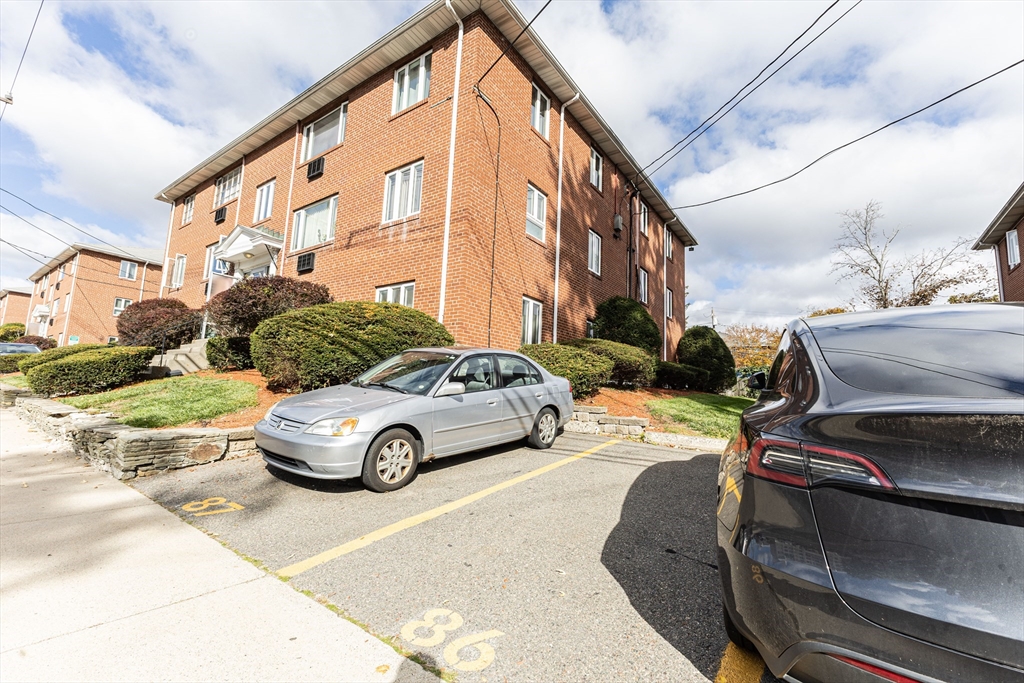 186 Lexington Street, Unit 8 Watertown, MA 02472 - Photo 18 of 22 a view of a street with cars