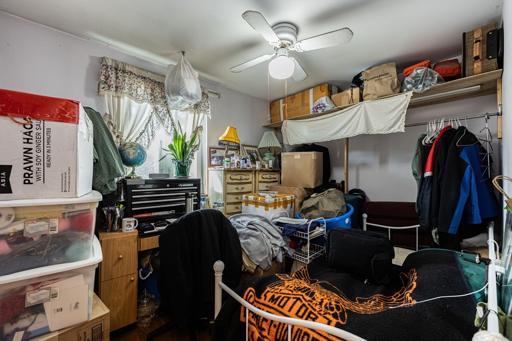186 Lexington Street, Unit 8 Watertown, MA 02472 - Photo 6 of 22 a living room with furniture a air conditioner and a window