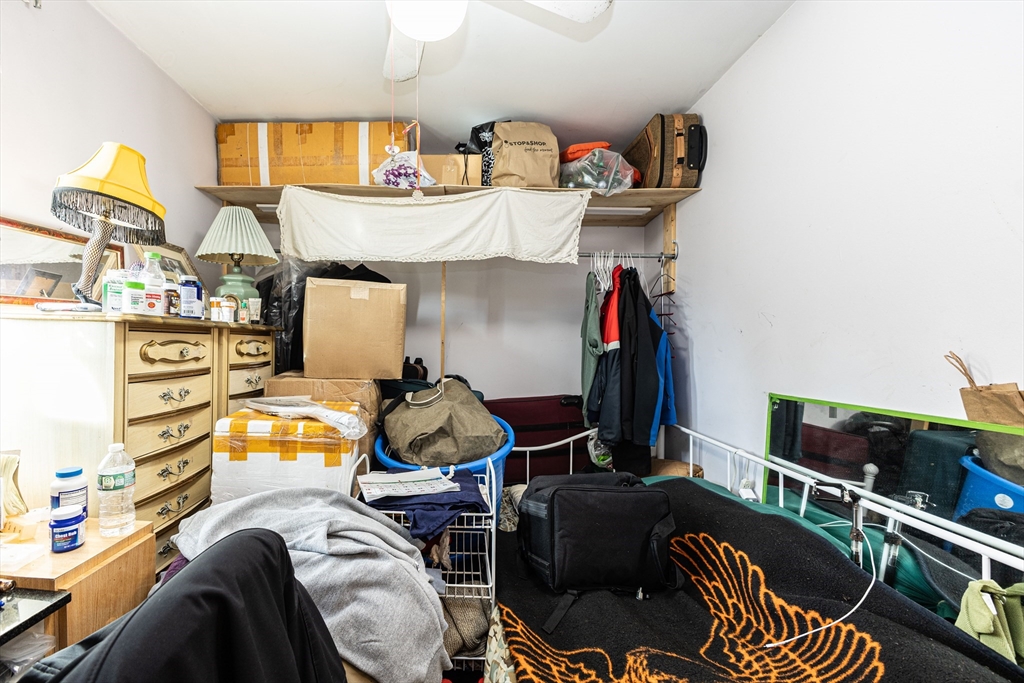 186 Lexington Street, Unit 8 Watertown, MA 02472 - Photo 7 of 22 a living room with furniture and a flat screen tv