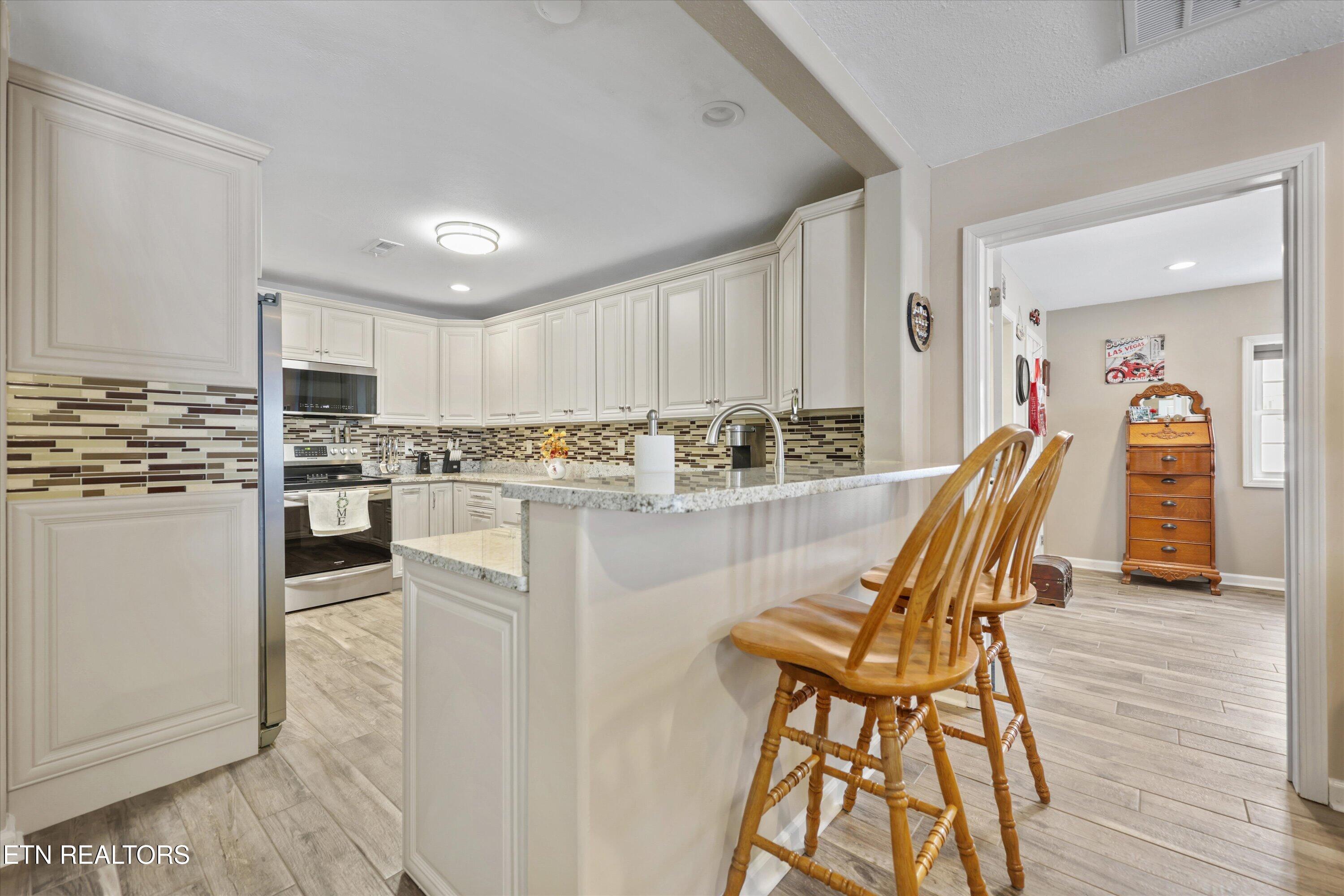 407 Kahite Trail Vonore, TN 37885 - Photo 22 of 38 lower level full kitchen