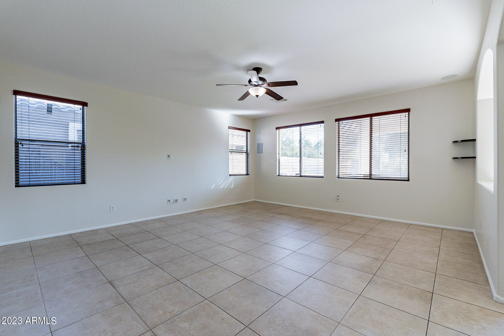 2943 East Quiet Hollow Lane Phoenix, AZ 85024 - Photo 29 of 65 a view of an empty room with a window