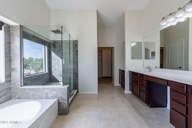 a close view of a sink and dishwasher in a bathroom