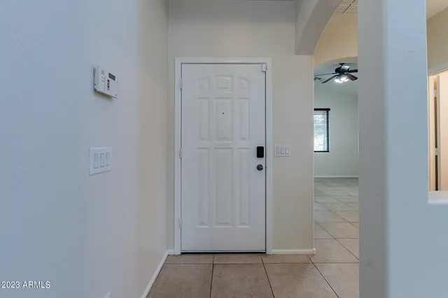 a kitchen with stainless steel appliances granite countertop wooden cabinets a stove top oven a sink and dishwasher