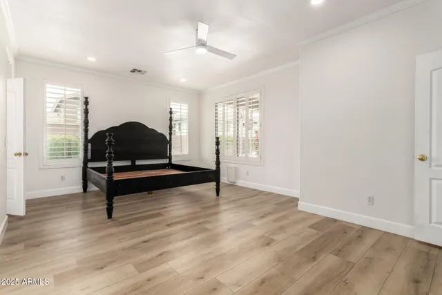 an living room with wooden floor and furniture