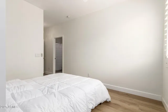 a close up of a white bed