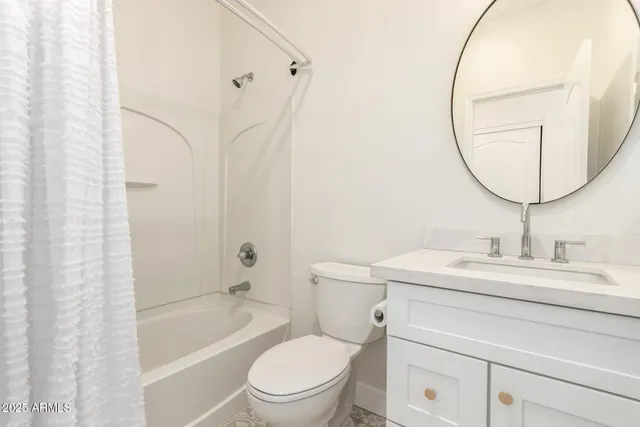 a bathroom with a toilet a sink and a bathtub