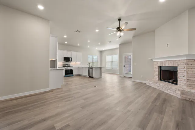 a view of kitchen and kitchen with electric equipment