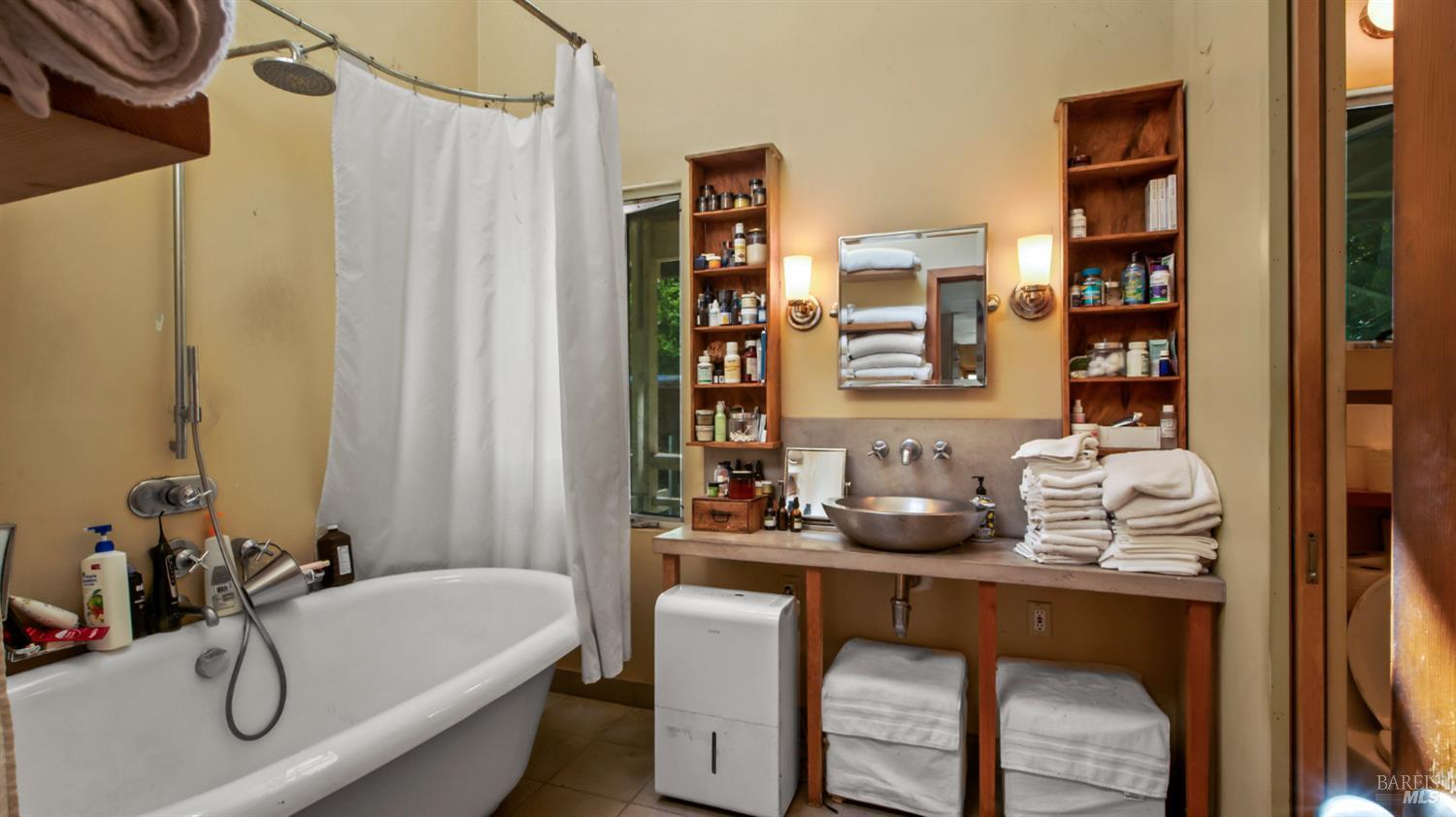 1 Alamo Way Lagunitas, CA 94938 - Photo 21 of 47 a bathroom with a tub sink and a mirror