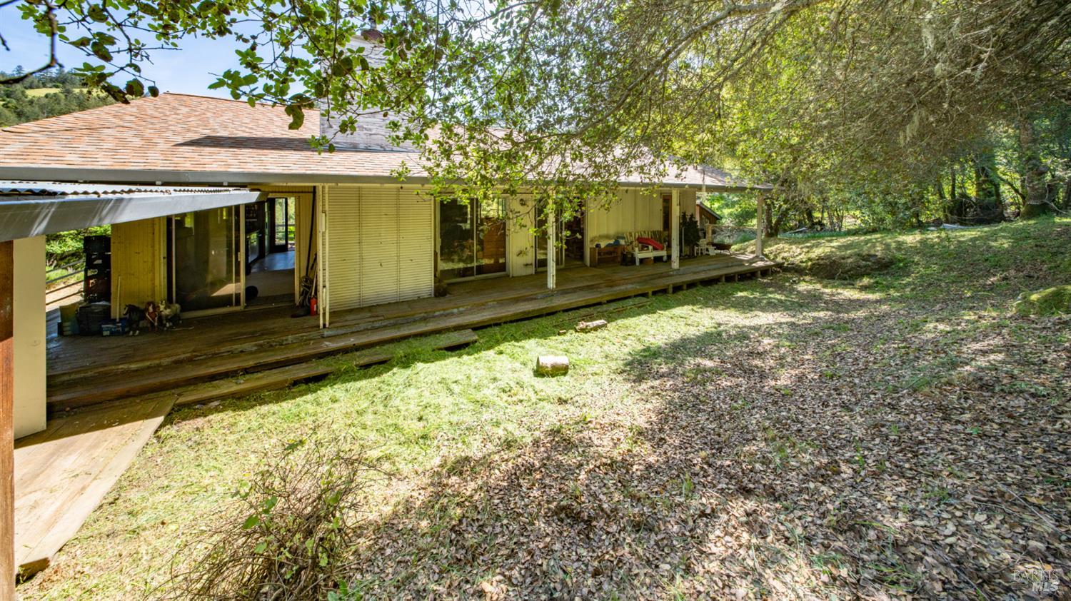 1 Alamo Way Lagunitas, CA 94938 - Photo 30 of 47 a front view of a house with a yard