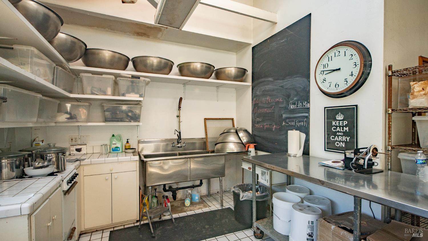 1 Alamo Way Lagunitas, CA 94938 - Photo 35 of 47 a kitchen with a cabinets and a stove top oven