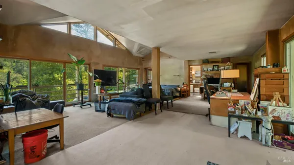 a view of an ocean from a mountain