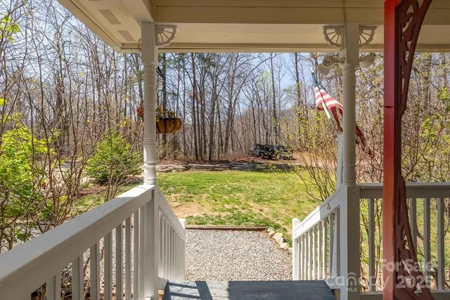 a view of backyard from a balcony