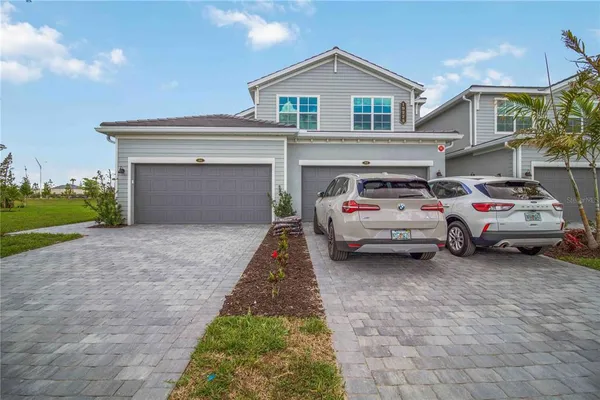 a view of car parked in front of house