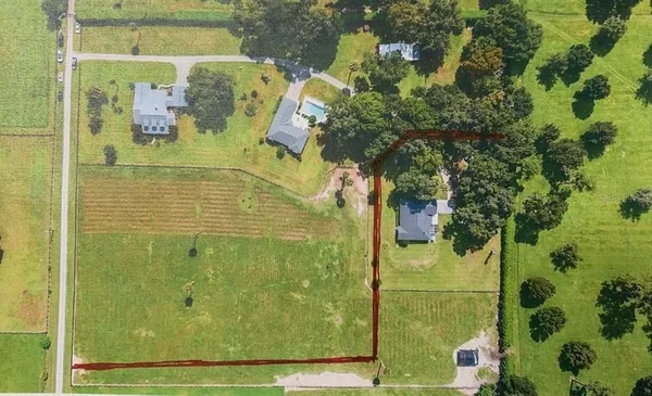 a view of an outdoor space and swimming pool