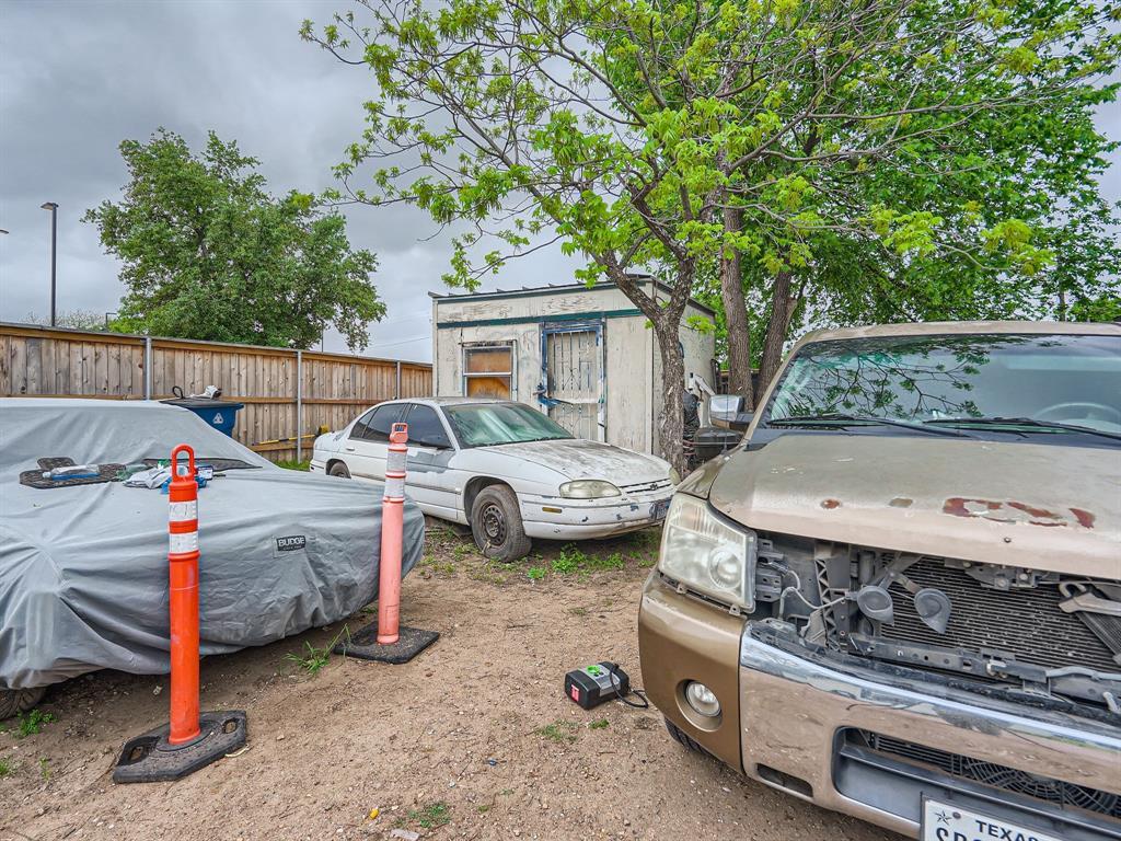 1122 Chicon Street Austin, TX 78702 - Photo 13 of 20 a view of a backyard with a car parked