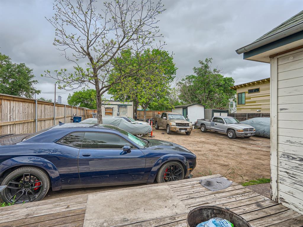 1122 Chicon Street Austin, TX 78702 - Photo 6 of 20 a view of a backyard with table and chairs and a fire pit