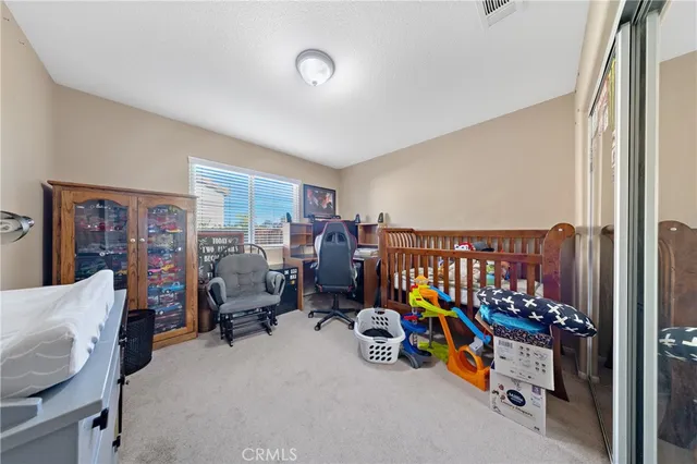 a view of a livingroom with furniture