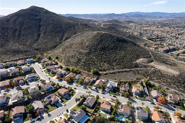an aerial view of residential house with an outdoor space
